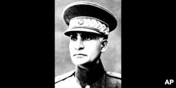 FILE - This is an undated photo of Reza Shah Pahlavi in an unidentified place. The discovery in Iran of a mummified body near the site of a former royal mausoleum has raised speculation it could be the remains of the late Reza Shah Pahlavi, founder of the Pahlavi dynasty.