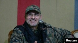 FILE - Top Hezbollah commander Mustafa Badreddine is seen in this handout picture released by Hezbollah Media office on May 13, 2016.