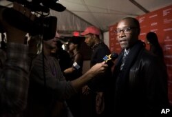FILE - Don Cheadle talks about "Miles Ahead" during the 2016 Sundance Film Festival in Park City, Utah, Jan. 22, 2016.