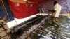Rapid Support Forces display disarmed weapons during Sudanese President's Omar al-Bashir visit to the war-torn Darfur region at Rapid Support Forces Headquarter in Umm Al-Qura, Darfur, Sudan, Sept. 23, 2017. 