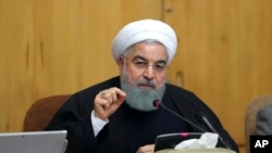 លោក​ប្រធានាធិបតី​អ៊ីរ៉ង់ Hassan Rouhani ថ្លែង​នៅ​ក្នុង​កិច្ចប្រជុំ​ក្នុង​ក្រុង​តេហេរ៉ង់ កាលពី​ថ្ងៃទី៣១ ខែធ្នូ ឆ្នាំ២០១៧។
