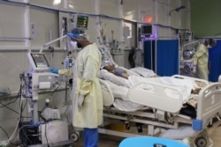 A doctor checks a ventilator at a quarantine center run by Medecins Sans Frontieres (Doctors Without Borders) in Aden, Yemen, June 27, 2020.