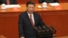 Chinese President Xi Jinping speaks during a ceremony to commemorate the 90th anniversary of the founding of the People's Liberation Army at the Great Hall of the People in Beijing, Aug. 1, 2017. 