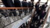 FILE - Students at the Pyongyang University of Science and Technology descend stairs after a seminar and lecture, Oct. 5, 2011.
