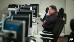 A worker sits at a computer at the Department of Homeland Security National Cybersecurity and Communications Integration Center (NCCIC) in Arlington, Va