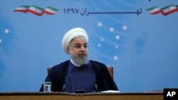 Presiden Iran Hassan Rouhani menghadiri rapat pejabat kementerian luar negeri di Teheran, Iran, Minggu, 22 Juli 2018.