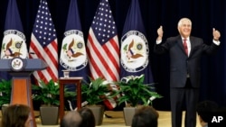 Secretary of State Rex Tillerson gives the thumbs-up as he arrives to speak to State Department employees, May 3, 2017, at the State Department in Washington. 