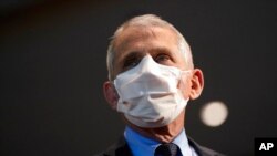 FILE - Dr. Anthony Fauci, director of the National Institute of Allergy and Infectious Diseases, speaks at the National Institutes of Health, in Bethesda, Md., Dec. 22, 2020.