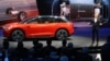 Electric Car Makers Woo Chinese Buyers with Range, Features