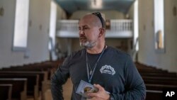 Santiago Montoya, the 'mayordomo' or caretaker of the historic sanctuary of San Lorenzo or St. Lawrence, speaks during an interview, in Bernalillo, New Mexico, April 17, 2023.