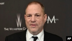 FILE - Harvey Weinstein arrives at The Weinstein Company and Netflix Golden Globes afterparty in Beverly Hills, California, Jan. 8, 2017. 