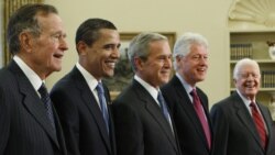 President George W. Bush, center, poses with President-elect Barack Obama, and former presidents, from left, George H.W. Bush, le