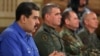 Venezuela's President Nicolas Maduro speaks during a broadcast with members of the government and military high command members at Miraflores Palace in Caracas, Apr. 30, 2019. (Miraflores Palace handout via Reuters) 