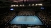 Nick Kyrgios dari Australia (kanan), dan Dominic Thiem dari Austria berhadapan dalam pertandingan putaran ketiga, kejuaraan tenis Australia Terbuka di Melbourne, Australia, Jumat, 12 Februari 2021. (AP Photo / Hamish Blair)