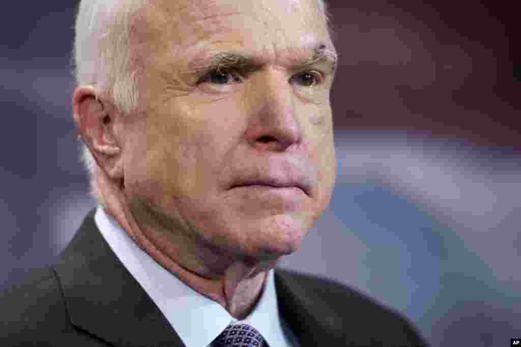 FILE - Sen. John McCain, R-Ariz., speaks to reporters on Capitol Hill in Washington.