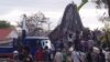 Local authorities and villagers looked for people who were trapped under the building debris after a Buddhist temple under the construction collapsed in Siem Reap, Cambodia, on Dec. 2, 2019. 