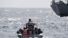 ARCHIVES-Les forces spéciales nigérianes naviguent pour intercepter des pirates lors d'un exercice conjoint entre le personnel naval nigérian et marocain au large des côtes de Lagos, le 20 mars 2019.