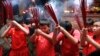 Indonesian ethnic Chinese children pray at a temple in the China Town in Jakarta, Indonesia, January 7, 2012. 