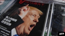 FILE - A magazine featuring U.S. President-elect Donald Trump is seen at a bookstore in Beijing, Dec. 12, 2016.