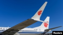 Pesawat Boeing 737 MAX 8 milik maskapai penerbangan Air China, di landasan bandara di Beijing, China, 11 Maret 2019. (REUTERS/Stringer)