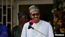 FILE - Nigeria's President Muhammadu Buhari. Ibrahim Mustafa Magu will replaces Ibrahim Lamorde as the country's anti-corruption chief.