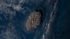 This satellite image taken by Himawari-8, a Japanese weather satellite operated by Japan Meteorological Agency and released by National Institute of Information and Communications Technology, shows an undersea volcano eruption at the Pacific nation of Ton