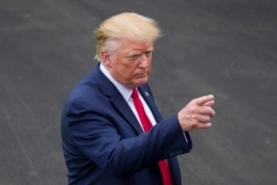 FILE - President Donald Trump speaks with reporters before departing on Marine One from the South Lawn of the White House in Washington, Sept. 9, 2019.