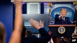 President Donald Trump takes questions as he speaks during a news conference in the James Brady Press Briefing Room at the White House, Sept. 4, 2020, in Washington.