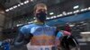 Olympian Displays Sign Calling for 'No War in Ukraine'
