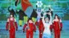 Eritrea's flag bearer, Shannon-Ogbnai Abeda, leads the delegation during the opening ceremony of the Beijing 2022 Winter Olympic Games, in Beijing, on Feb. 4, 2022.