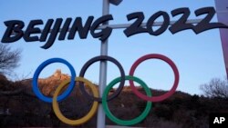 The Badaling section of the Great Wall of China is framed by the Olympic Rings on the outskirts of Beijing, China, on Feb. 8, 2022.
