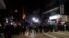 FILE - Police arrive to chase away protestors in Hong Kong, Jan. 1, 2020. 