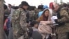 Despite Fiery Rhetoric, Syrian Refugees Arrive in US