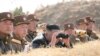 North Korean leader Kim Jong Un guides artillery fire competition in this image released by North Korea's Korean Central News Agency on March 20, 2020.