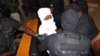 Former Chad Strongman Habre Carried Into Court