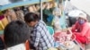 FILE PHOTO - An ethnic Vietnamese vendor sells food near Tonle Sap Lake, Kampong Thom province, Cambodia, August 7, 2016. (Leng Len/VOA Khmer) ​