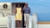 President Barack Obama and first lady Michelle Obama arrive at Cape Cod Coast Guard Station in Bourne, Mass., Aug. 10, 2013.