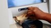 Nigeria's Naira Touches Record Low After Official Devaluation