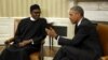 President Barack Obama meets with Nigerian President Muhammadu Buhari (L) in the Oval Office of the White House in Washington July 20, 2015.
