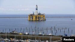 FILE - A Shell Oil Company drilling rig is shown in Port Angeles, Washington.