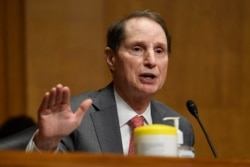 FILE - Sen. Ron Wyden speaks at a Senate Finance Committee hearing on Capitol Hill in Washington, June 30, 2020.