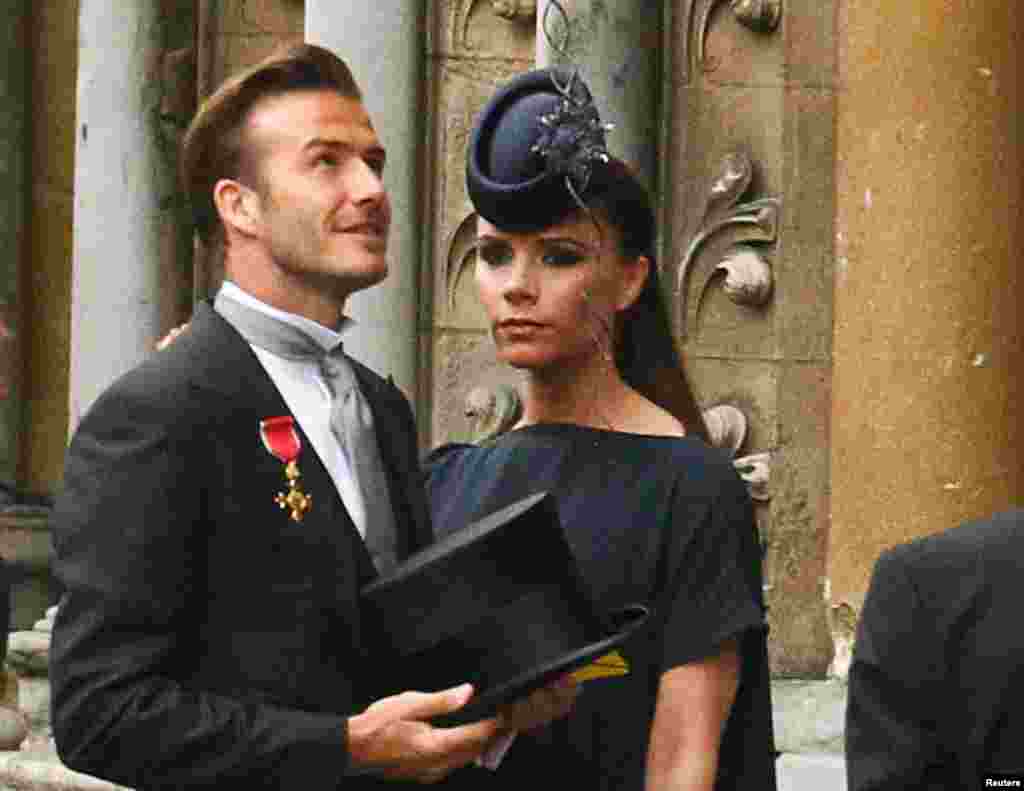 The Beckhams arrive at Westminster Abbey before the wedding of Britain&#39;s Prince William and Kate Middleton, in London April 29, 2011. 