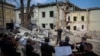 Shelling kills 4 in Ukraine; drone attack sparks Russian oil depot fire