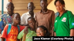 Toyin, Johndy, his family members and colleagues of LIGHT FOR THE WORLD. 