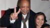 Quincy Jones, left, and Emily Bear arrive at The Recording Academy's 4th Annual "An Evening of Jazz" at The Village Recording Studios, Feb. 6, 2013 in Los Angeles.