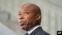 FILE - New York City Mayor Eric Adams speaks to reporters at a news conference in New York, Sept. 16, 2024. Adams has been indicted following a federal corruption investigation, but the indictment is sealed, The New York Times reported Sept. 25.