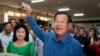 FILE - Prime Minister Hun Sen of the Cambodian People's Party shows off his ballot paper before voting in local elections at Takhmau polling station in Kandal province, southeast of Phnom Penh, June 4, 2017. 