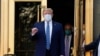 FILE - President Donald Trump walks out of Walter Reed National Military Medical Center to return to the White House after receiving treatments for COVID-19 in Bethesda, Md., Oct. 5, 2020.