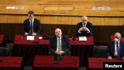Lebanon's Prime Minister Najib Mikati attends a parliamentary session, to discuss the new cabinet's policy program and hold a vote of confidence at UNESCO Palace in Beirut, Lebanon, Sept. 20, 2021. 