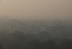 Buildings are seen shrouded in smog in New Delhi, India, Nov. 5, 2019.